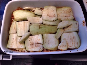 Divide and cut up the eggplant so it fits snugly into the casserole dish.